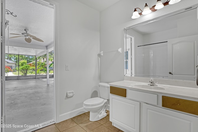 310 Chennault Ln, Rockledge, FL 32955 - full bathroom with vanity, tile patterned floors, a ceiling fan, and a shower