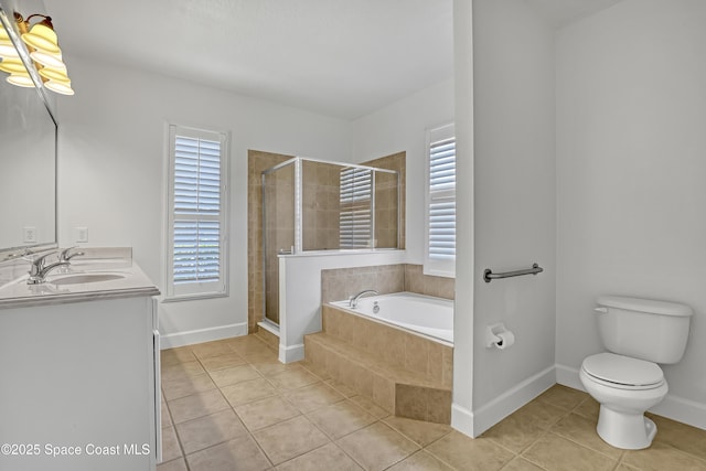 310 Chennault Ln, Rockledge, FL 32955 - bathroom featuring tile patterned flooring, a garden tub, and healthy amount of natural light