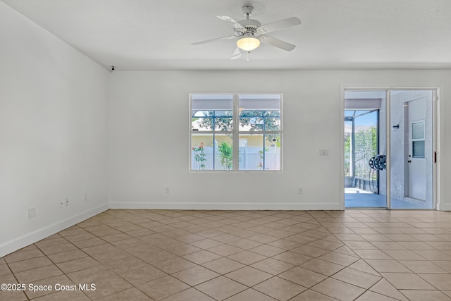 310 Chennault Ln, Rockledge, FL 32955 - empty room with light tile patterned flooring and a ceiling fan