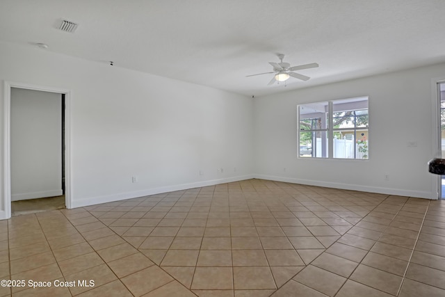 310 Chennault Ln, Rockledge, FL 32955 - unfurnished room with a ceiling fan and light tile patterned flooring