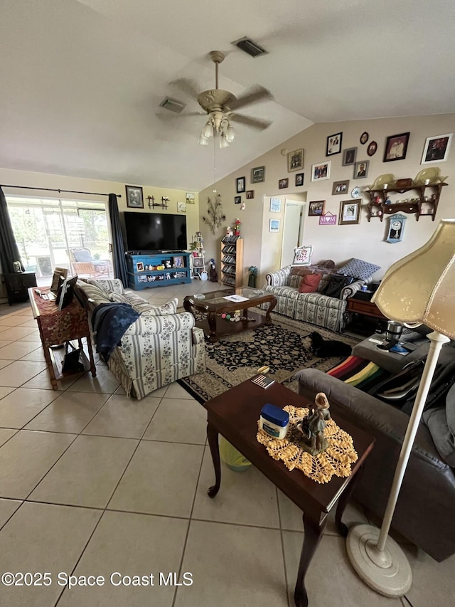 237 Jacaranda Ave NW, Palm Bay, FL 32907 - tiled living area with lofted ceiling and ceiling fan