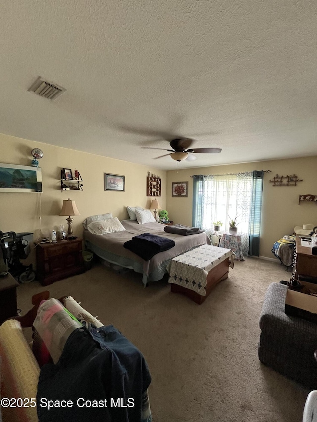 237 Jacaranda Ave NW, Palm Bay, FL 32907 - carpeted bedroom featuring a textured ceiling and a ceiling fan