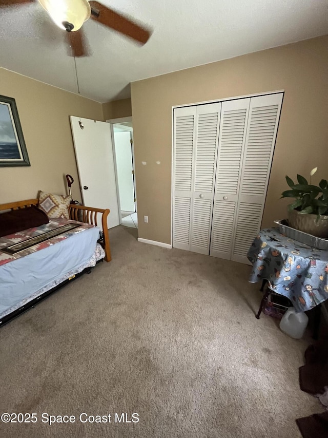 237 Jacaranda Ave NW, Palm Bay, FL 32907 - carpeted bedroom featuring a closet and a ceiling fan