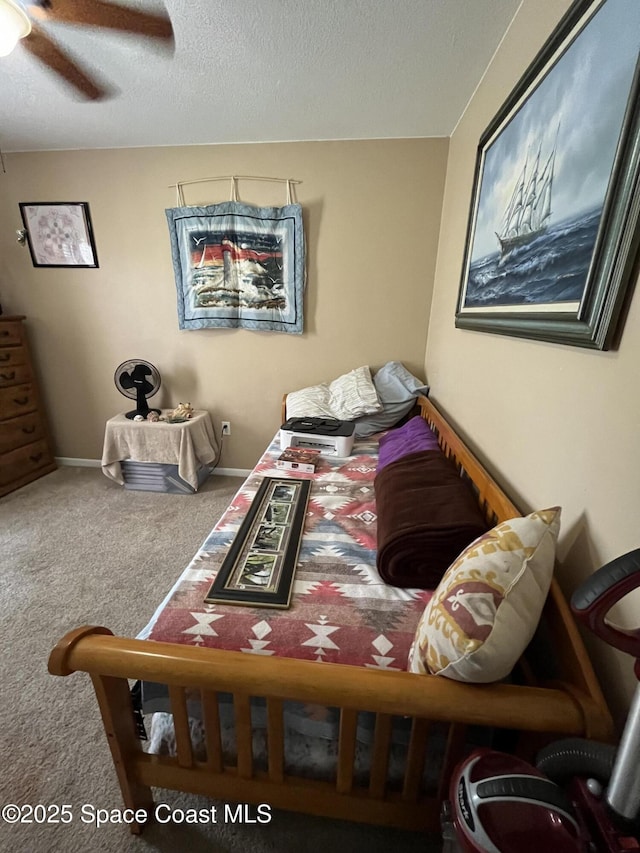 237 Jacaranda Ave NW, Palm Bay, FL 32907 - bedroom featuring carpet, ceiling fan, and a textured ceiling