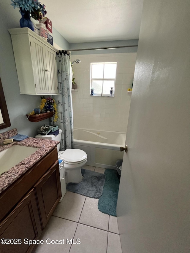 237 Jacaranda Ave NW, Palm Bay, FL 32907 - bathroom with tile patterned flooring, toilet, vanity, and shower / bath combo