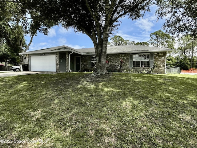 237 Jacaranda Ave NW, Palm Bay, FL 32907 - ranch-style house with an attached garage, driveway, and stone siding