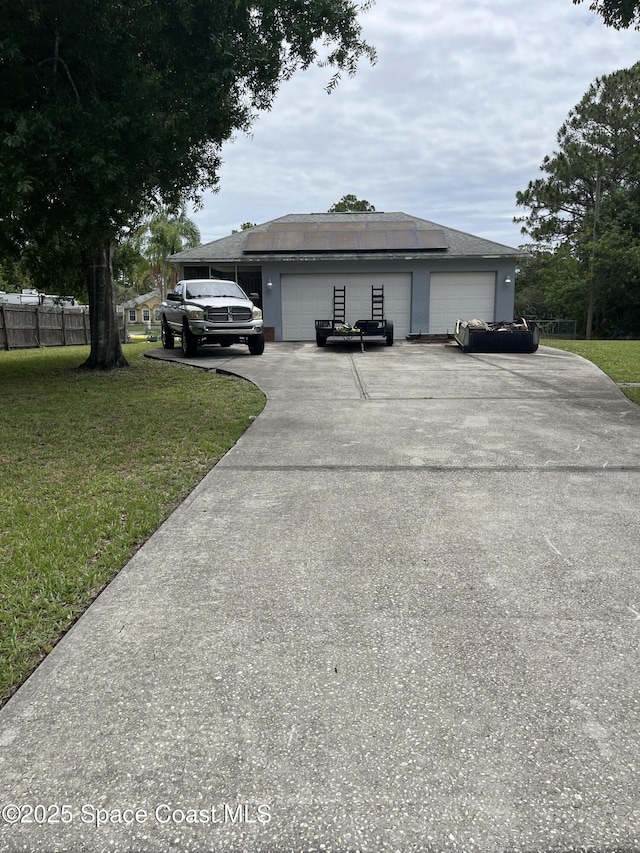 237 Jacaranda Ave NW, Palm Bay, FL 32907 - view of front of house featuring an attached garage and driveway