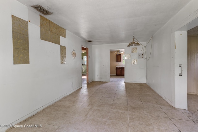 3774 Brockington Cir, Cocoa, FL 32926 - empty room featuring light tile patterned floors and ceiling fan