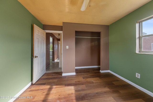 3774 Brockington Cir, Cocoa, FL 32926 - unfurnished bedroom with a closet and wood finished floors