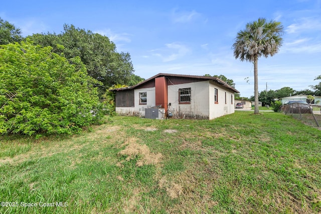 3774 Brockington Cir, Cocoa, FL 32926 - back of house featuring concrete block siding