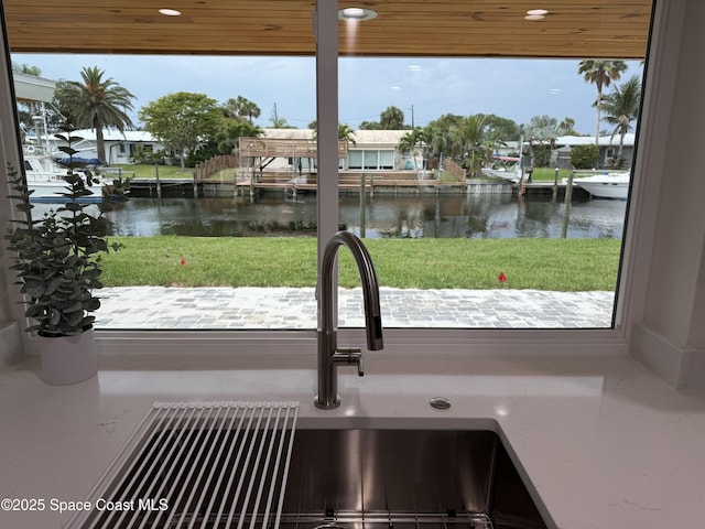 57 Riverview Ln, Cocoa Beach, FL 32931 - kitchen view of a sink and a large body of water