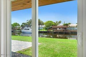 57 Riverview Ln, Cocoa Beach, FL 32931 - entryway featuring a water view