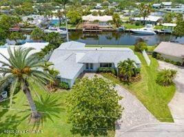 57 Riverview Ln, Cocoa Beach, FL 32931 - aerial view of property and surrounding area featuring a nearby body of water