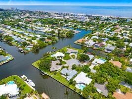 57 Riverview Ln, Cocoa Beach, FL 32931 - view of property location featuring a large body of water and nearby suburban area