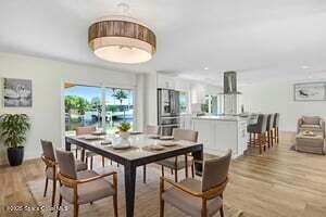 57 Riverview Ln, Cocoa Beach, FL 32931 - dining room with light wood-type flooring