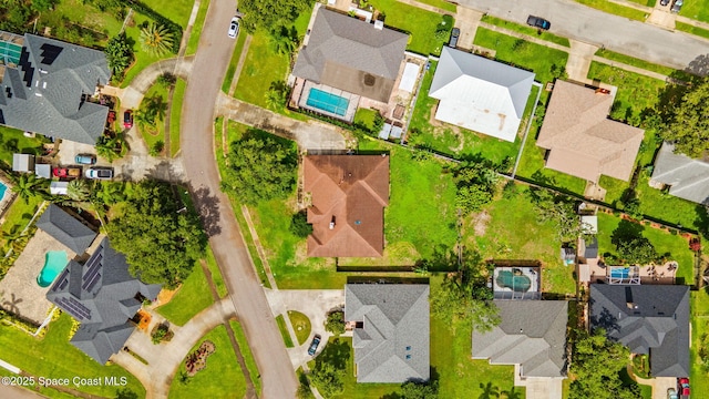 2180 Figtree Dr Unit 0, Titusville, FL 32780 - aerial perspective of suburban area with a pool