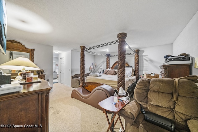 2180 Figtree Dr Unit 0, Titusville, FL 32780 - carpeted bedroom with a textured ceiling and connected bathroom