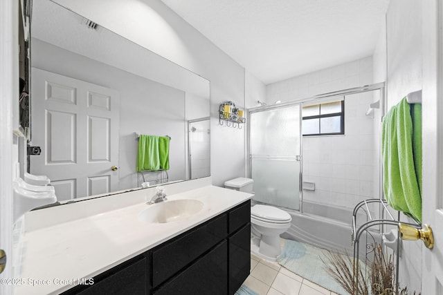 2180 Figtree Dr Unit 0, Titusville, FL 32780 - bathroom with vanity, bath / shower combo with glass door, and tile patterned floors
