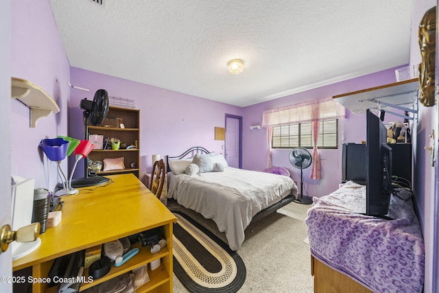 2180 Figtree Dr Unit 0, Titusville, FL 32780 - bedroom featuring a textured ceiling and carpet floors