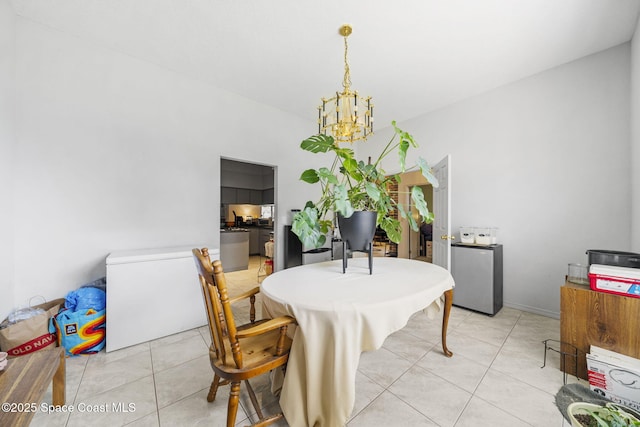 2180 Figtree Dr Unit 0, Titusville, FL 32780 - dining room featuring a chandelier and light tile patterned floors