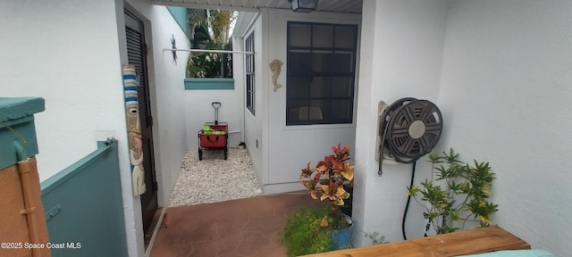 290 Paradise Blvd # 84, Indialantic, FL 32903 - view of exterior entry featuring stucco siding