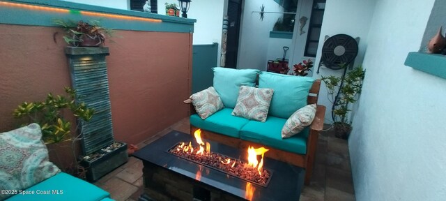 290 Paradise Blvd # 84, Indialantic, FL 32903 - balcony with a fire pit