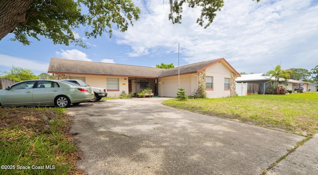 880 Williamsburg Dr, Titusville, FL 32780 - single story home with concrete driveway and a garage