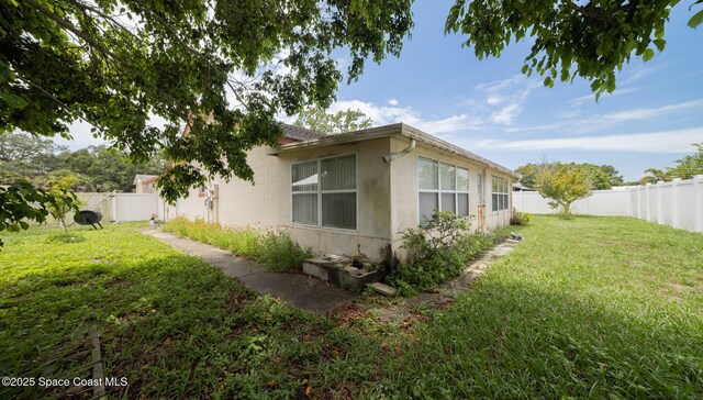 880 Williamsburg Dr, Titusville, FL 32780 - view of side of property