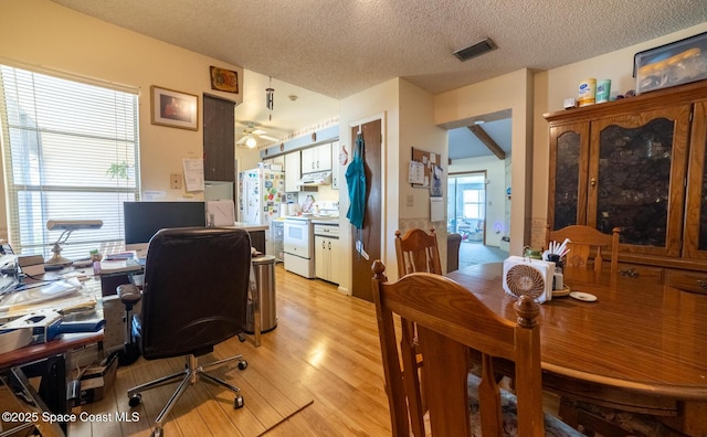 880 Williamsburg Dr, Titusville, FL 32780 - office with light wood finished floors, a textured ceiling, and ceiling fan