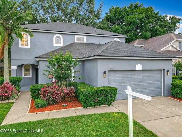 9525 Southern Garden Cir, Altamonte Springs, FL 32714 - traditional-style house with stucco siding, concrete driveway, an attached garage, and a shingled roof