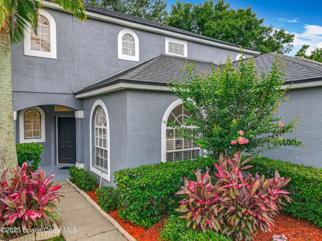9525 Southern Garden Cir, Altamonte Springs, FL 32714 - view of front of property featuring stucco siding
