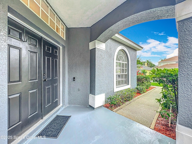 9525 Southern Garden Cir, Altamonte Springs, FL 32714 - entrance to property featuring stucco siding