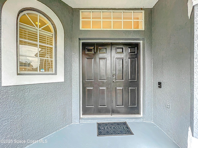 9525 Southern Garden Cir, Altamonte Springs, FL 32714 - entrance to property featuring stucco siding