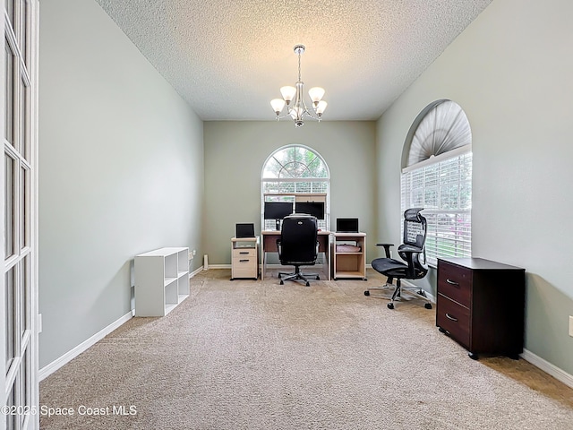 9525 Southern Garden Cir, Altamonte Springs, FL 32714 - carpeted office featuring a textured ceiling, a chandelier, and baseboards