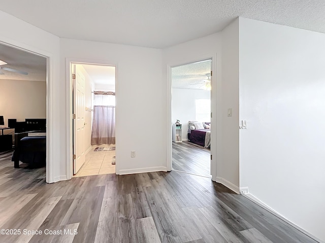 9525 Southern Garden Cir, Altamonte Springs, FL 32714 - empty room with a ceiling fan, wood finished floors, and baseboards