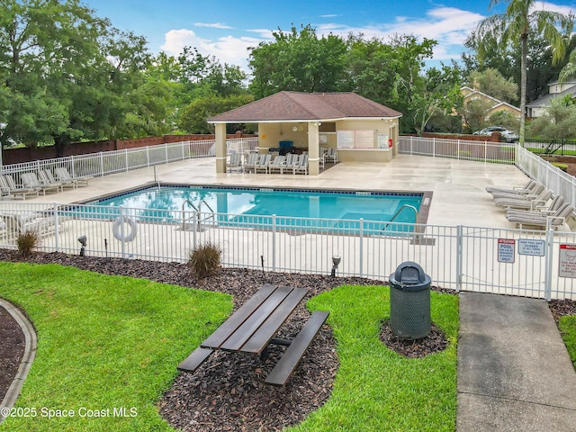 9525 Southern Garden Cir, Altamonte Springs, FL 32714 - community pool featuring a patio and view of wooded area