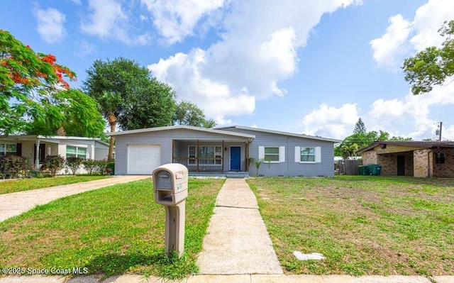 1108 Abington St, Cocoa, FL 32922 - view of front of house featuring driveway, a porch, and an attached garage