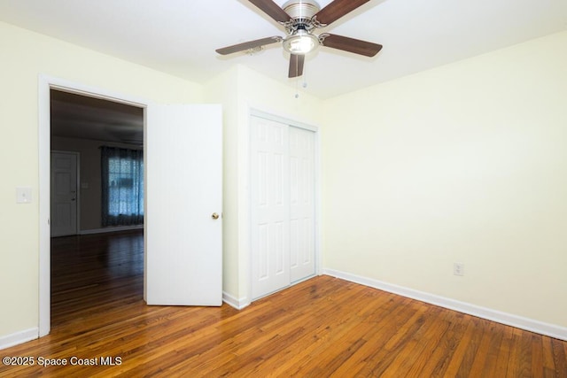 1108 Abington St, Cocoa, FL 32922 - unfurnished bedroom featuring hardwood / wood-style floors, a closet, and baseboards