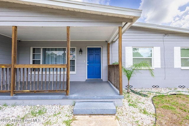 1108 Abington St, Cocoa, FL 32922 - doorway to property featuring covered porch