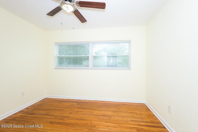 1108 Abington St, Cocoa, FL 32922 - empty room featuring plenty of natural light, wood finished floors, and ceiling fan