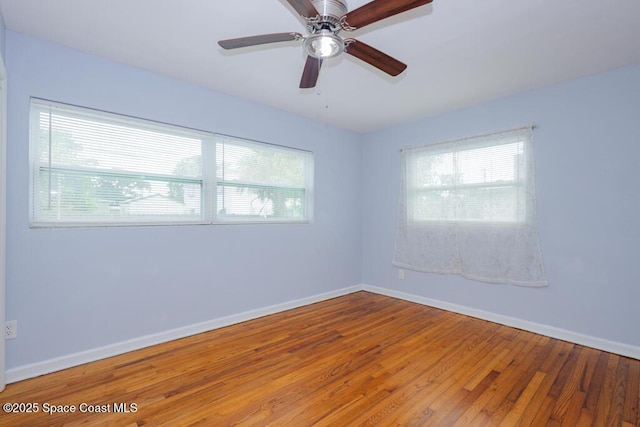 1108 Abington St, Cocoa, FL 32922 - unfurnished room featuring wood finished floors, baseboards, and a ceiling fan