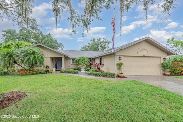 1510 Pioneer Dr, Melbourne, FL 32940 - ranch-style home with stucco siding, driveway, a garage, and a front yard