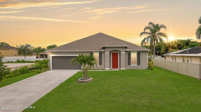 451 Barber St SE, Palm Bay, FL 32909 - ranch-style house featuring stucco siding, an attached garage, driveway, and a shingled roof