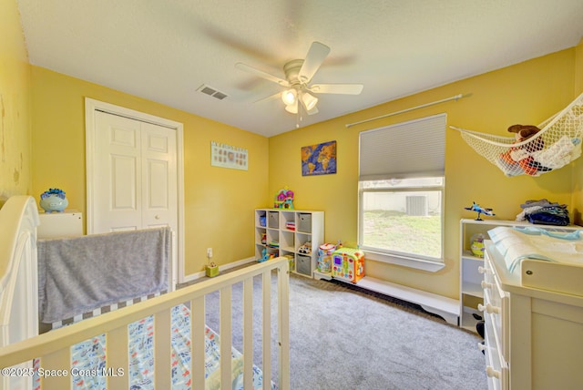 6485 Beard Ave, Cocoa, FL 32927 - bedroom featuring carpet floors, a closet, and a ceiling fan