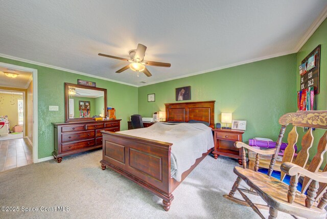 6485 Beard Ave, Cocoa, FL 32927 - bedroom featuring light carpet, crown molding, baseboards, and a ceiling fan