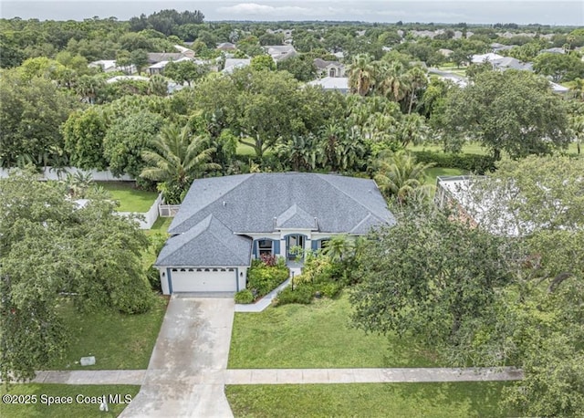 5151 4th Pl, Vero Beach, FL 32968 - aerial view of property and surrounding area featuring a tree filled landscape
