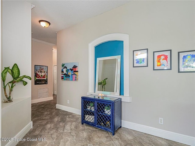 5151 4th Pl, Vero Beach, FL 32968 - hallway with baseboards and a textured ceiling