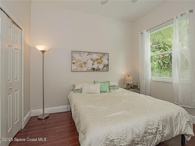 5151 4th Pl, Vero Beach, FL 32968 - bedroom with wood finished floors, baseboards, and a closet