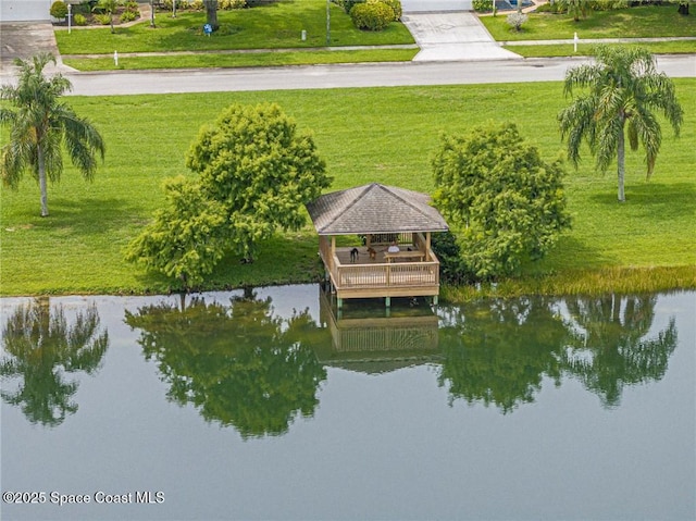 5151 4th Pl, Vero Beach, FL 32968 - dock area with a gazebo, a water view, and a yard