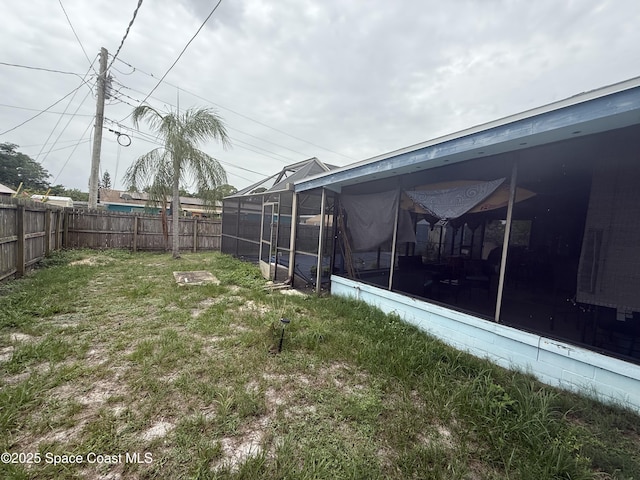 1003 Greenwood Way, Cocoa, FL 32922 - view of yard featuring a sunroom